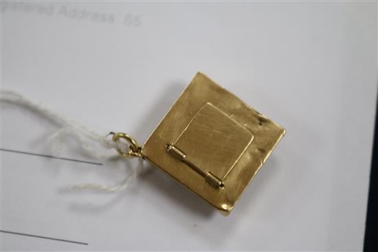 A yellow metal, lapis lazuli and two colour enamel locket pendant, 25mm.